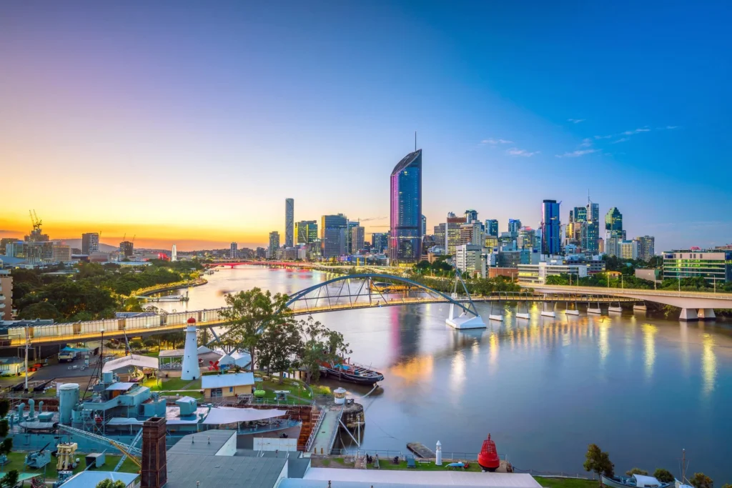 Brisbane city skyline and river at sunset